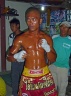 A Thai kick boxer is getting ready for the fight