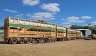 Our long vehicle looks tiny next to a Roadtrain